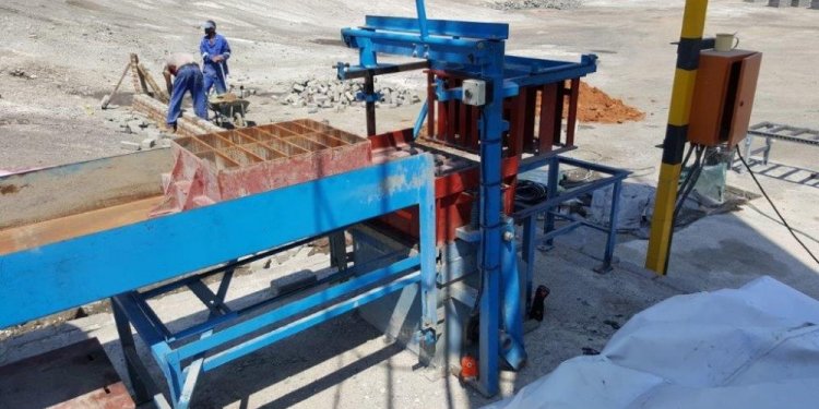 Brickmaking machine used with