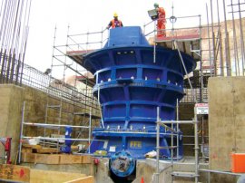 Installation work in progress on an FLSmidth primary gyratory crusher.