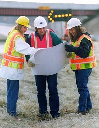 MDOT construction workers going over plans.