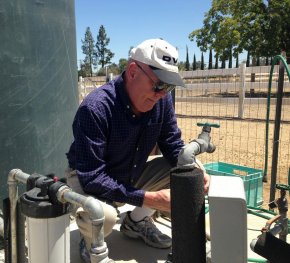 Peter Hammar’s private household well was reduced to a dribble this summer when the well nearly dried up. Hammar has grown accustomed to preserving his water by taking short showers, reusing sink water and limiting the watering of his once-green yard. (Ezra David Romero/Valley Public Radio)