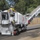 Asphalt milling machines