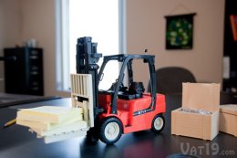 Remote Control Toy Forklift on desk.